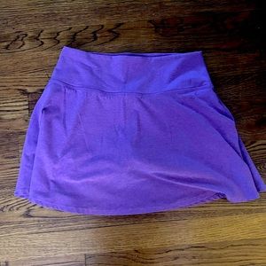 BEYOND YOGA purple exercise skirt with shorts built in (L)
